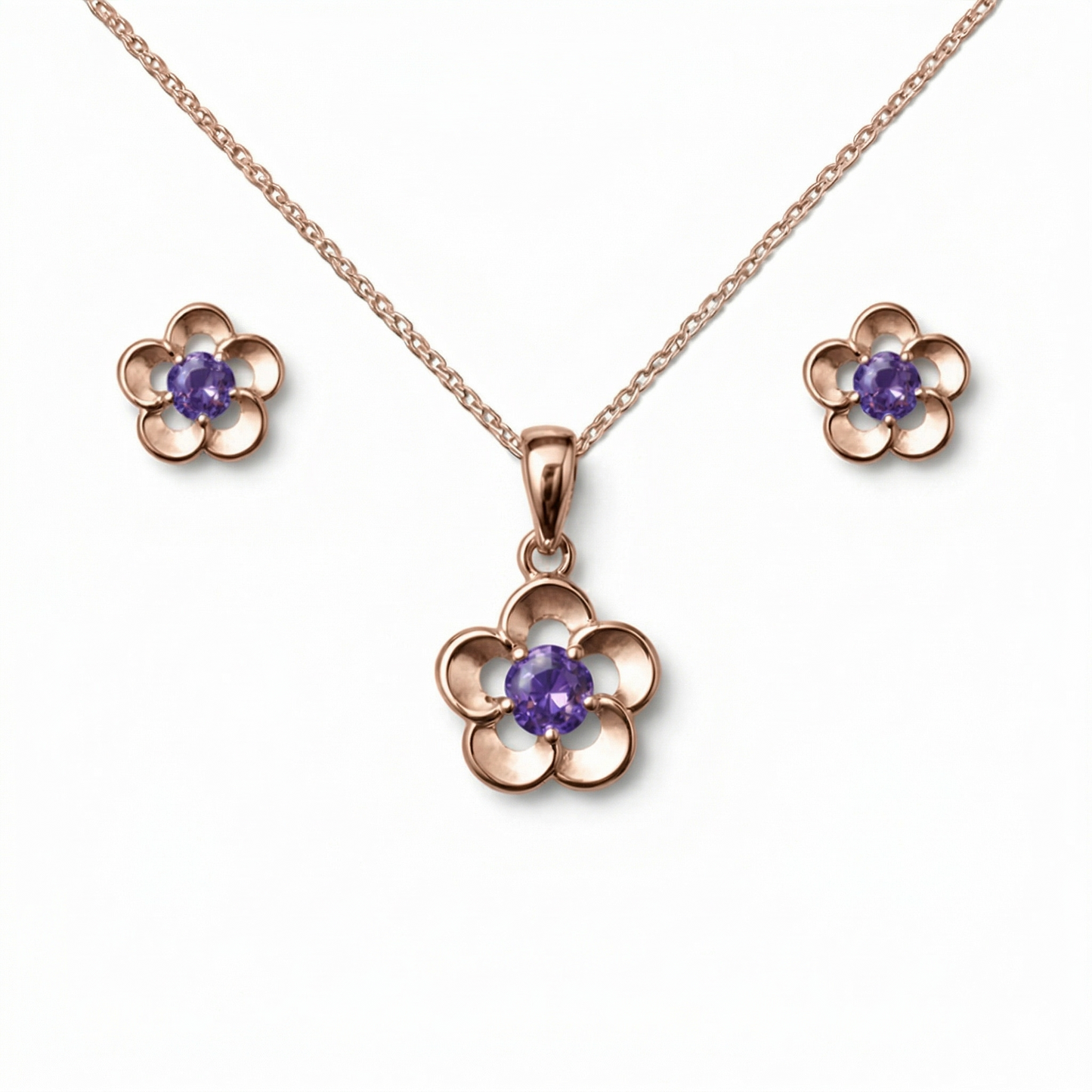 Rose gold flower-shaped jewelry set with purple gemstones