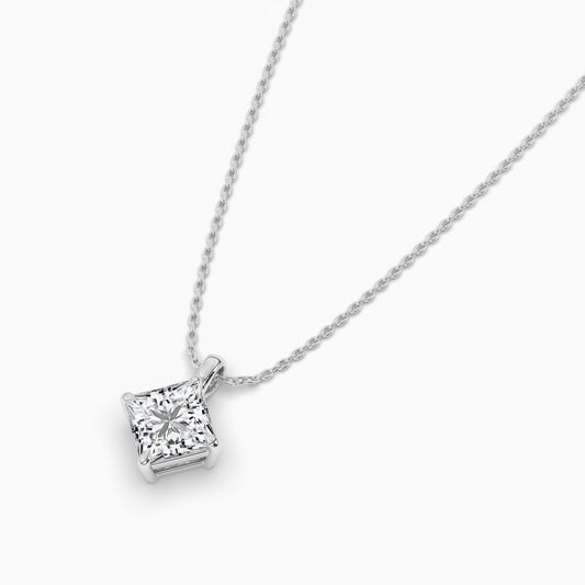 Silver necklace with a square-cut pendant on a white background