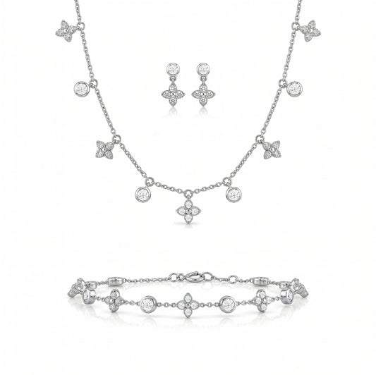 Silver jewelry set with necklace, bracelet, and earrings