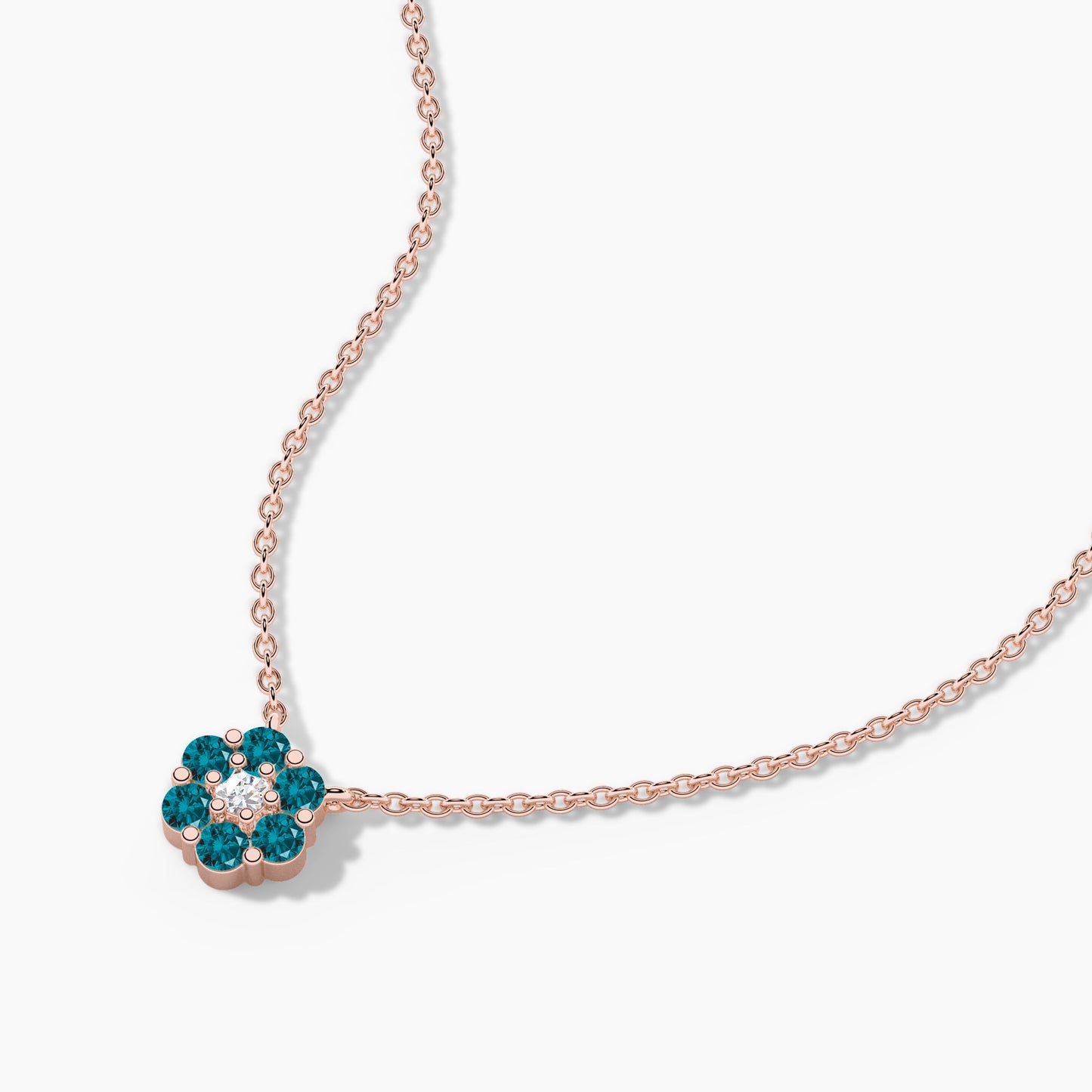 Rose gold necklace with a floral pendant on a white background