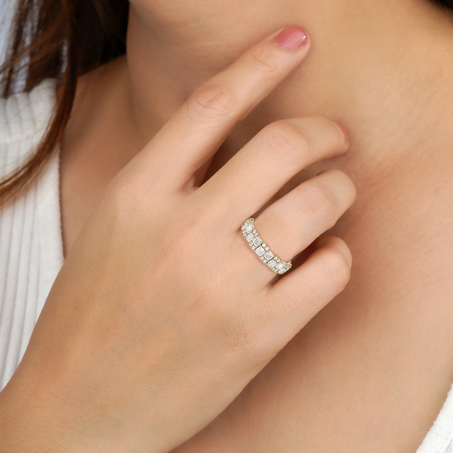 Close-up of a hand wearing a diamond ring