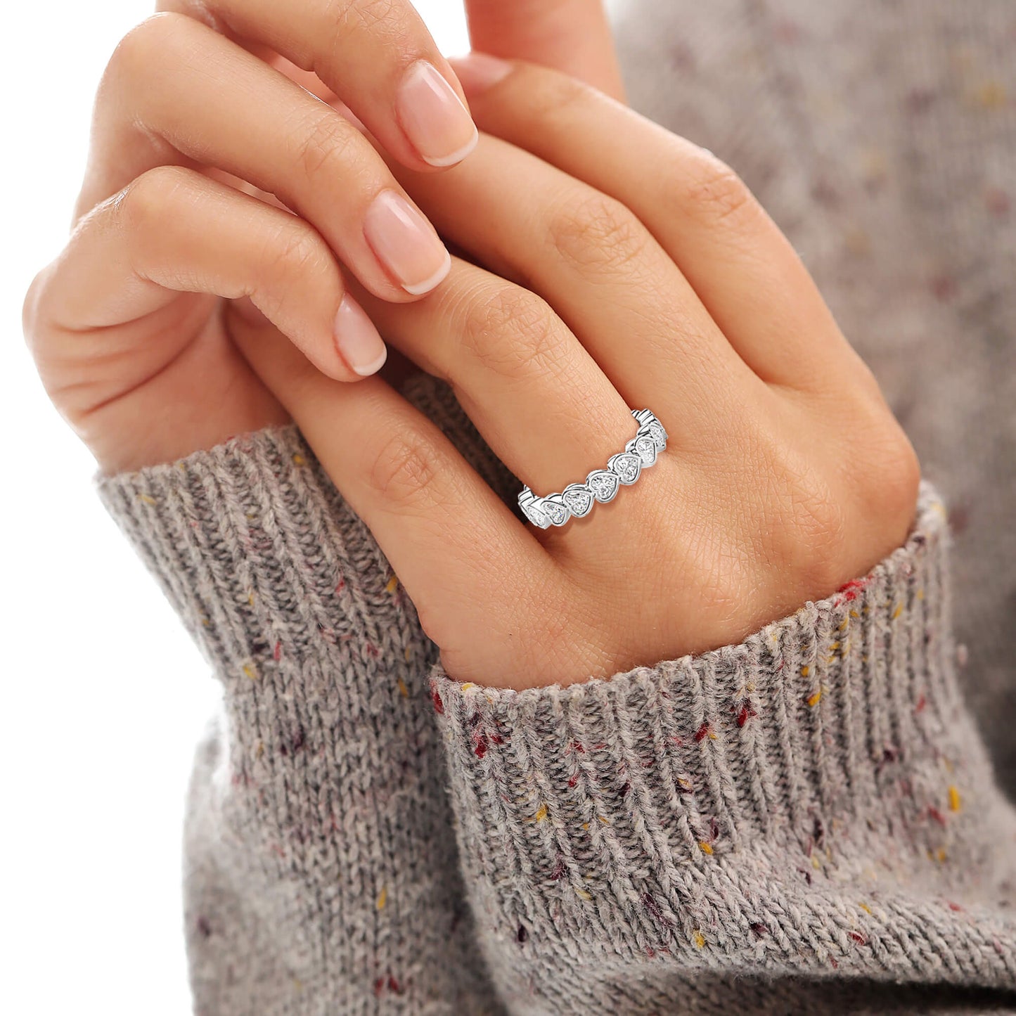 Close-up of a hand wearing a diamond ring