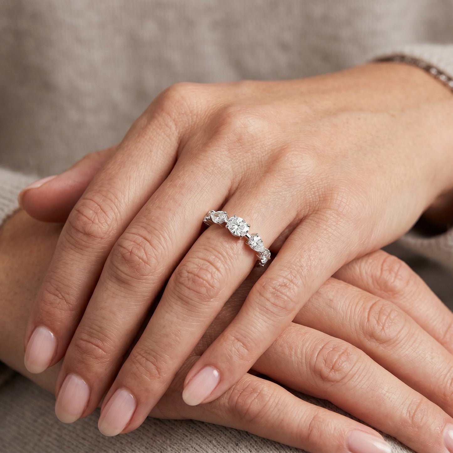 Close-up of a hand wearing a diamond ring