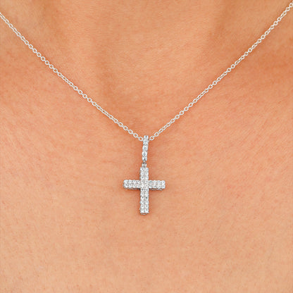 Silver necklace with a clear pendant worn 