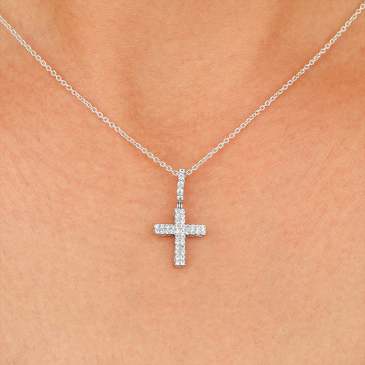 Silver necklace with a clear pendant worn 