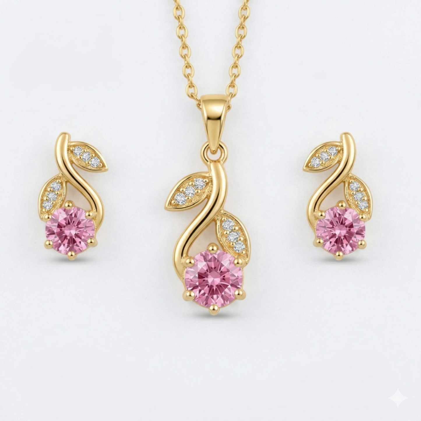Gold jewelry set with pink gemstones 