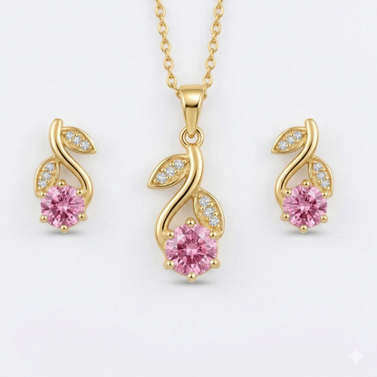 Gold jewelry set with pink gemstones 
