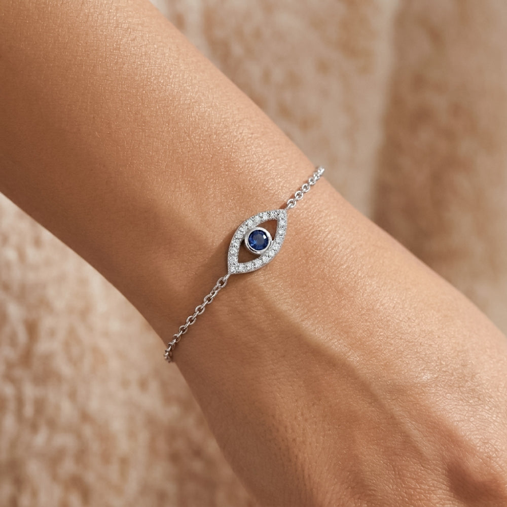 Silver bracelet with a blue gemstone