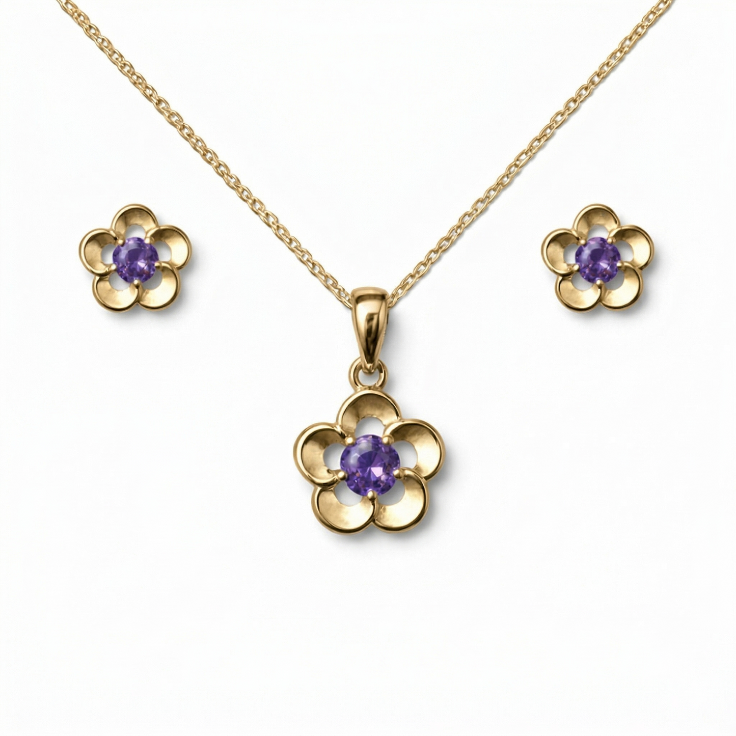 Gold flower-shaped jewelry set with purple stones