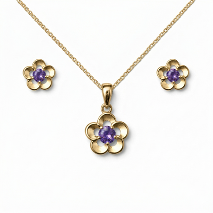 Gold flower-shaped jewelry set with purple stones