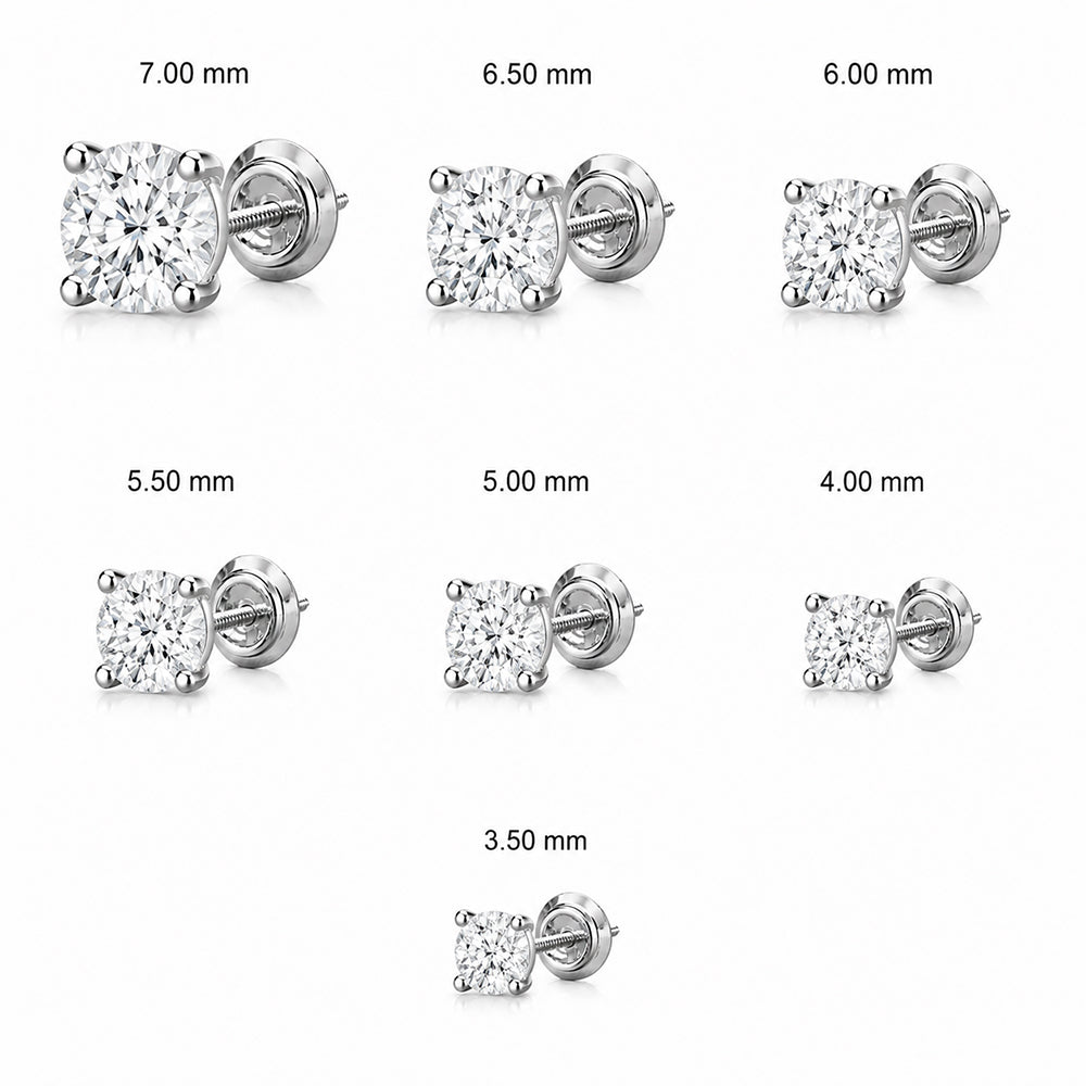 Seven silver solitaire stud earrings with round-cut
