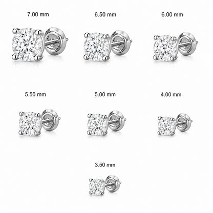 Seven silver solitaire stud earrings with round-cut