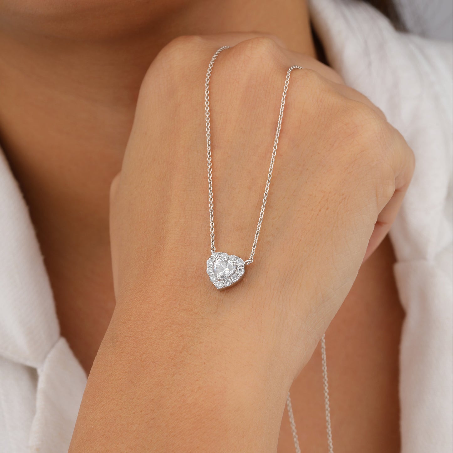Silver necklace with a heart-shaped pendant 