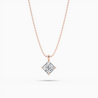 Rose gold necklace with a diamond pendant on a white background