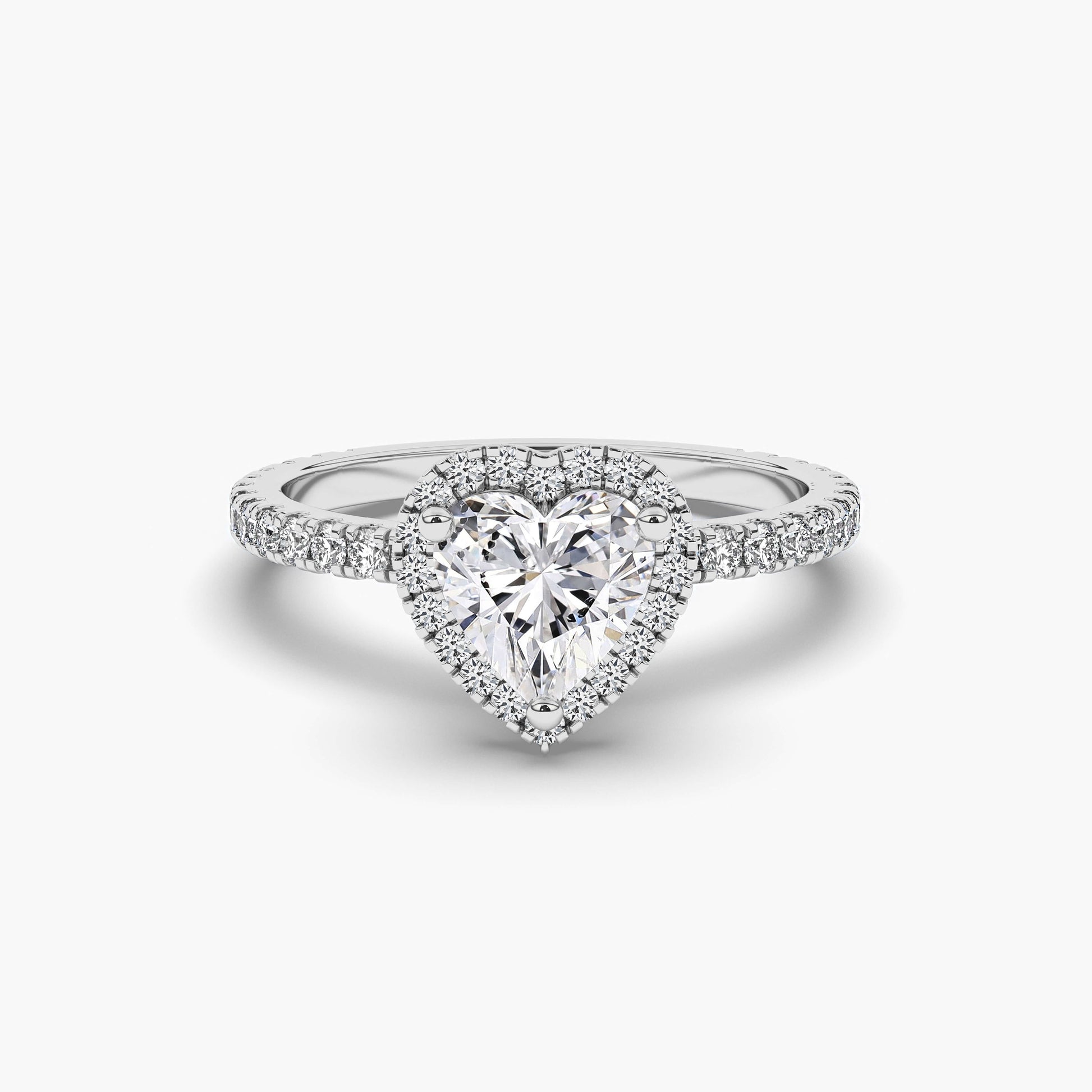 Diamond ring with a heart-shaped center stone