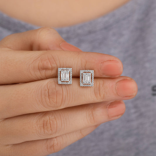 white and silver earrings
