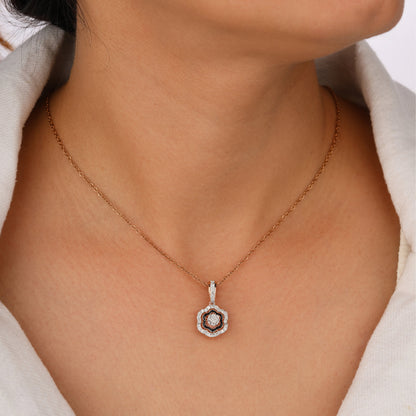 Necklace with a pendant worn by a person