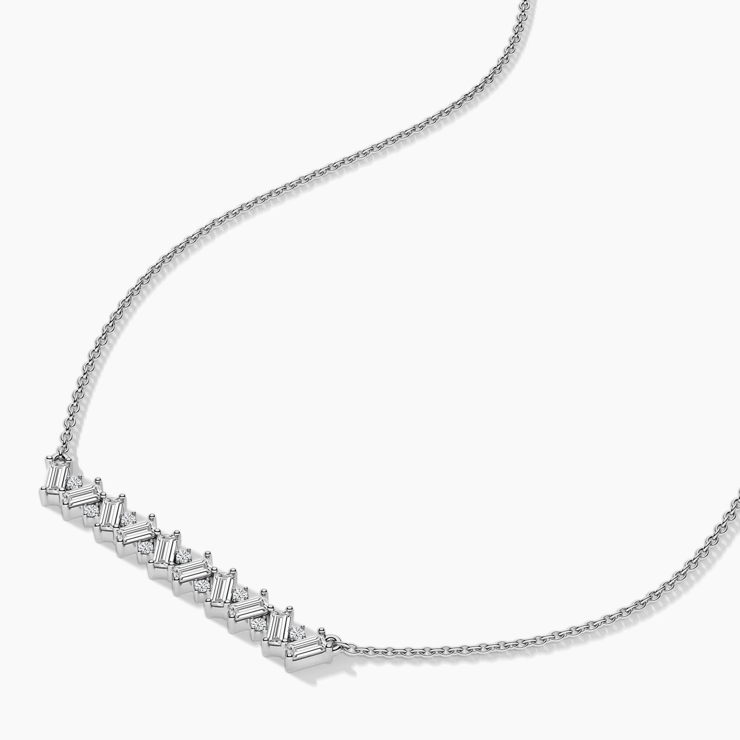 Silver necklace with a bar-shaped pendant on a white background