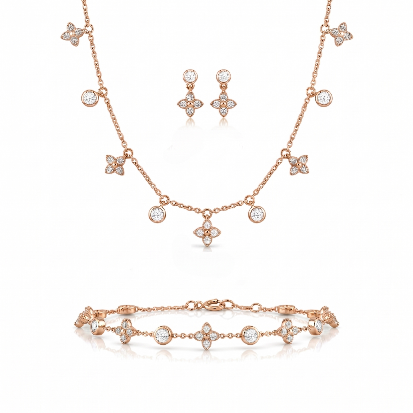 Rose gold jewelry set with necklace, bracelet, and earrings