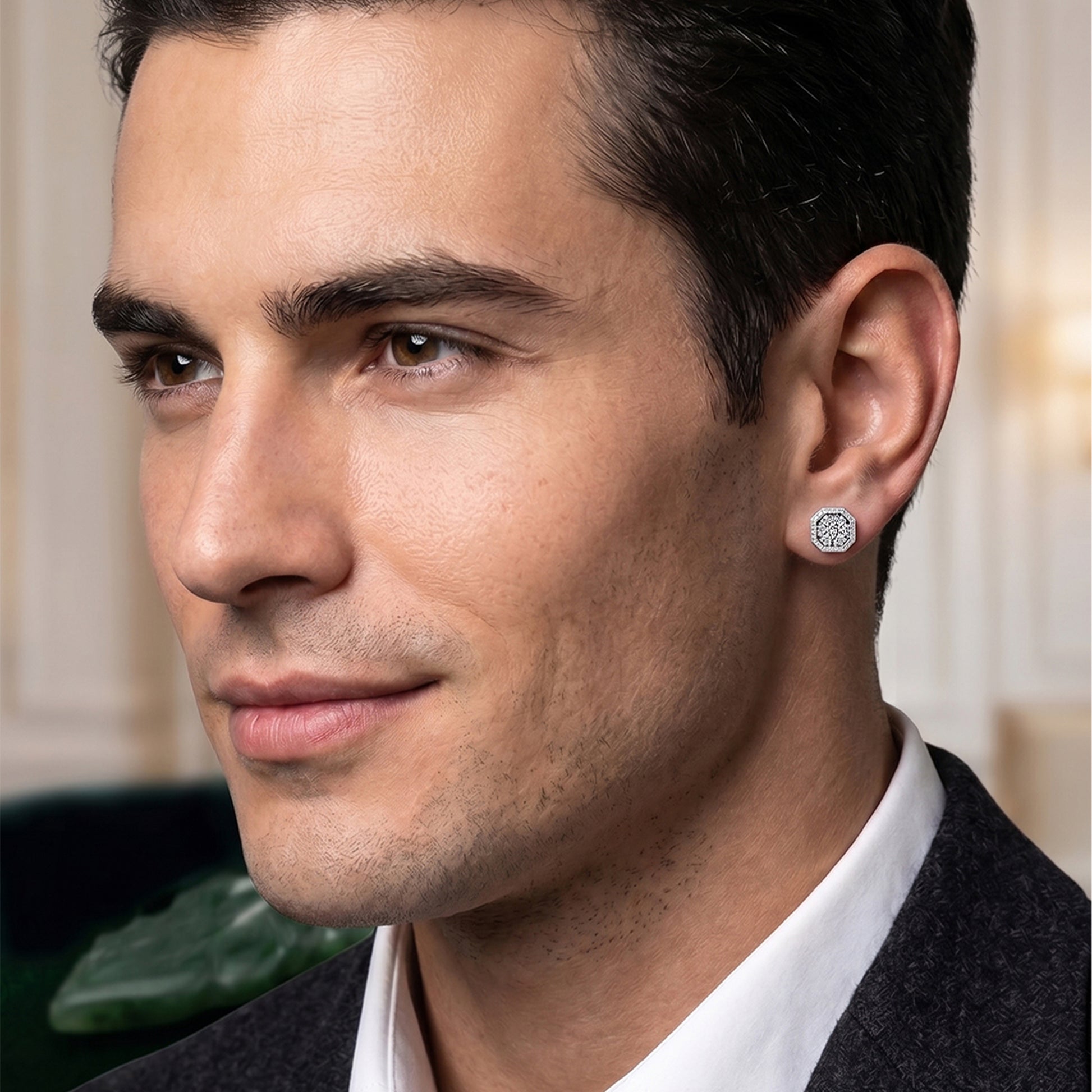 Close-up of a man wearing a silver earring 