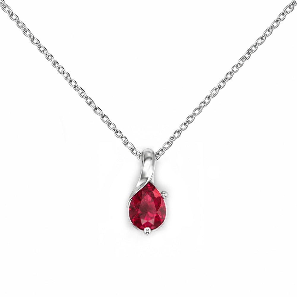 Silver necklace with a red teardrop pendant on a white background