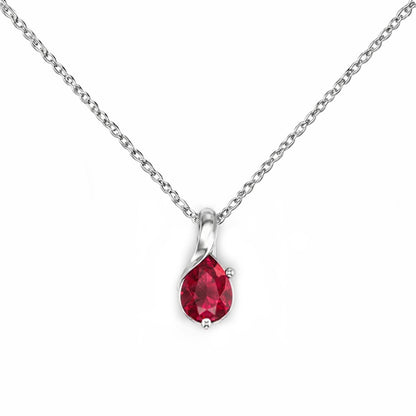 Silver necklace with a red teardrop pendant on a white background