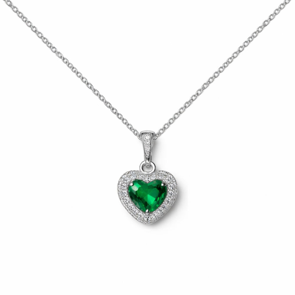 Heart-shaped emerald pendant on a silver chain