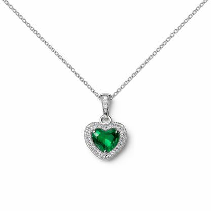 Heart-shaped emerald pendant on a silver chain