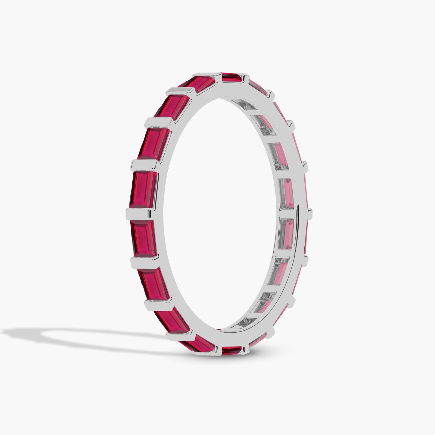 Silver ring with pink gemstones 