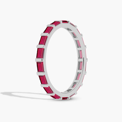 Silver ring with pink gemstones 