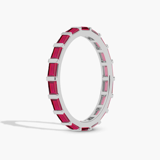 Silver ring with pink gemstones 