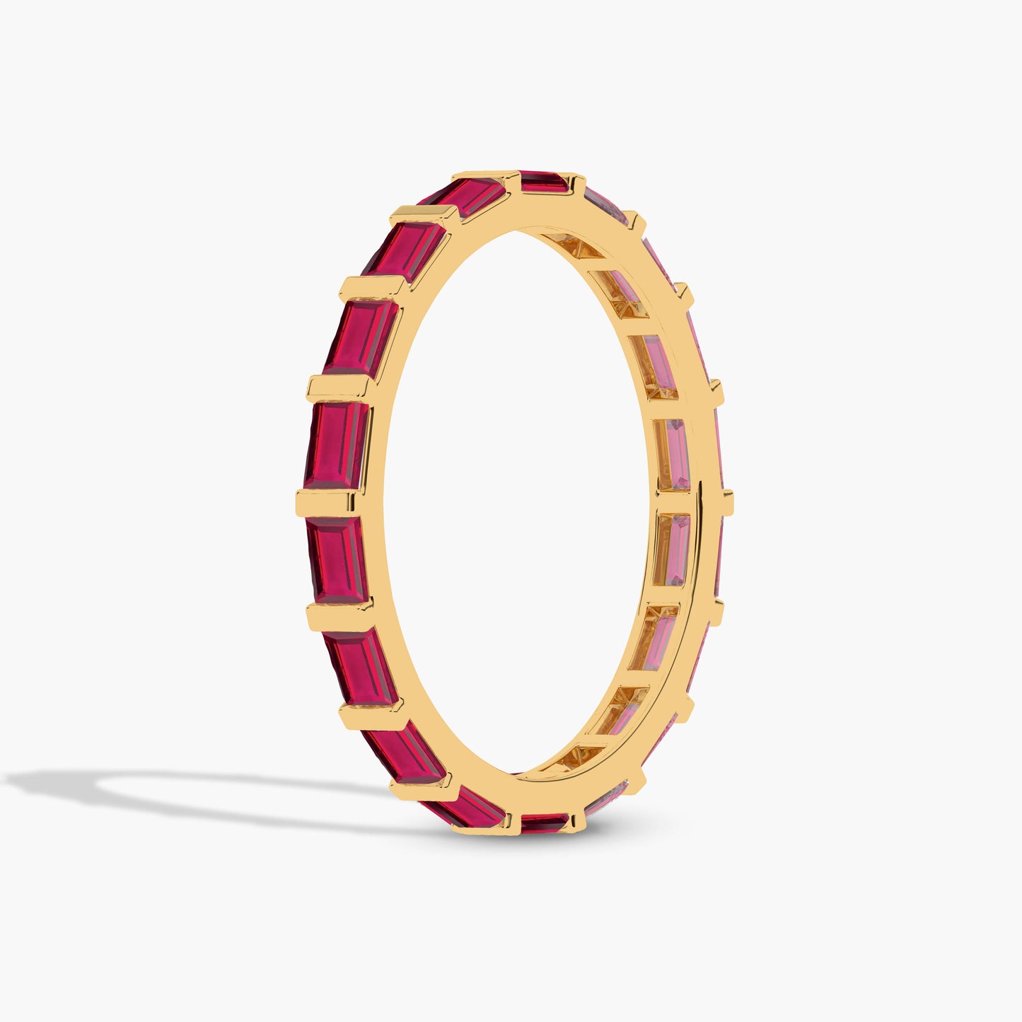 baguette diamond Gold ring with red gemstones 