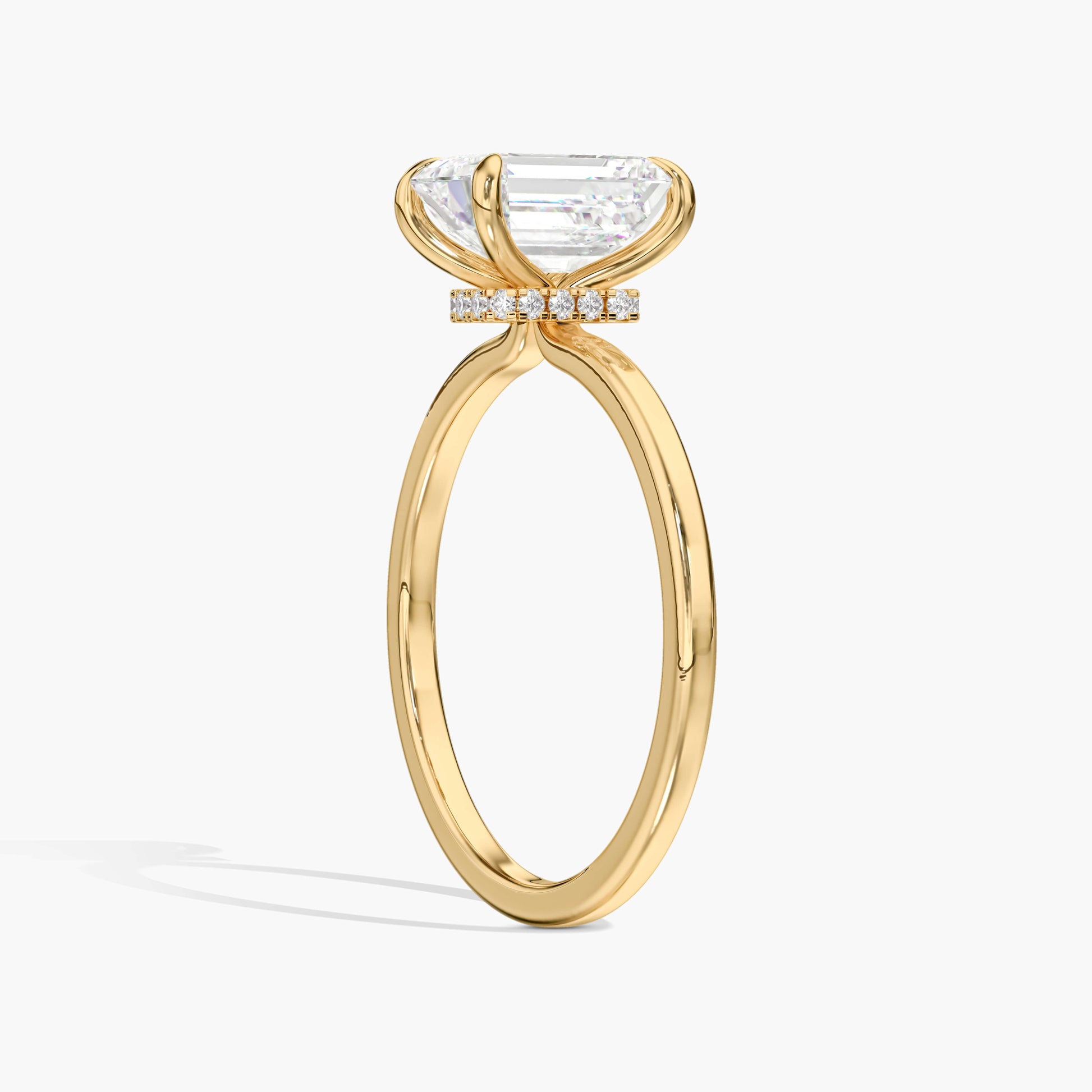 hidden halo engagement silver emerald ring