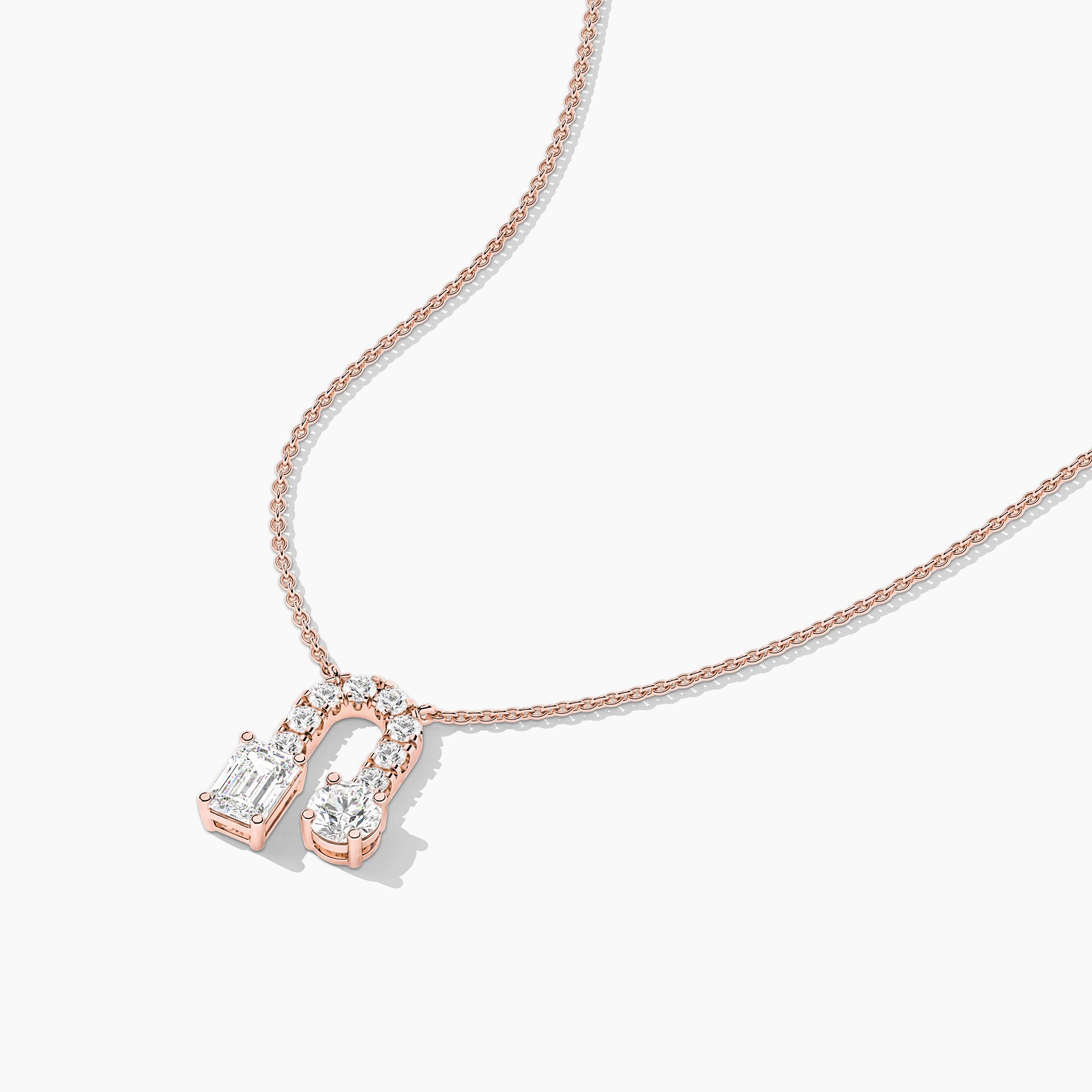 two diamond pendants hourse shoe
