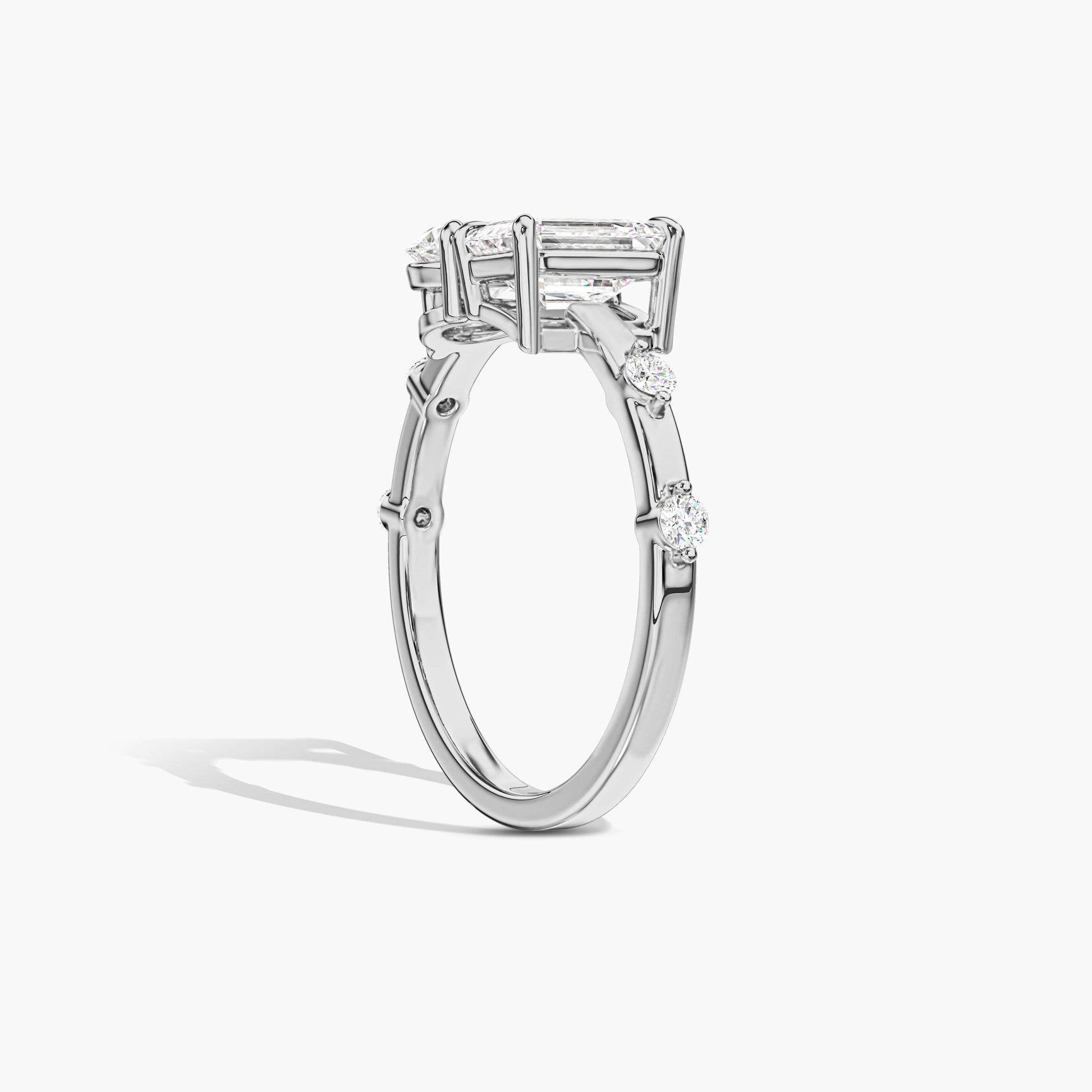 Diamond ring with a rectangular center stone 