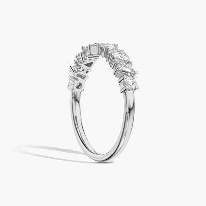 Diamond ring with a central gemstone and smaller stones 