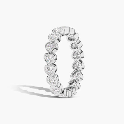 Silver ring with heart-shaped gemstones