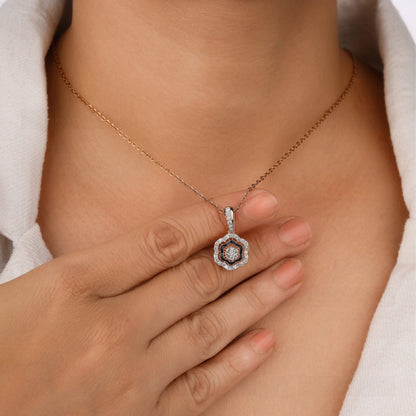 Necklace with a pendant worn by a person