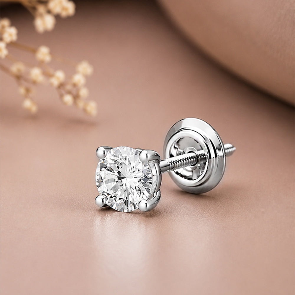A single round-cut diamond stud earring