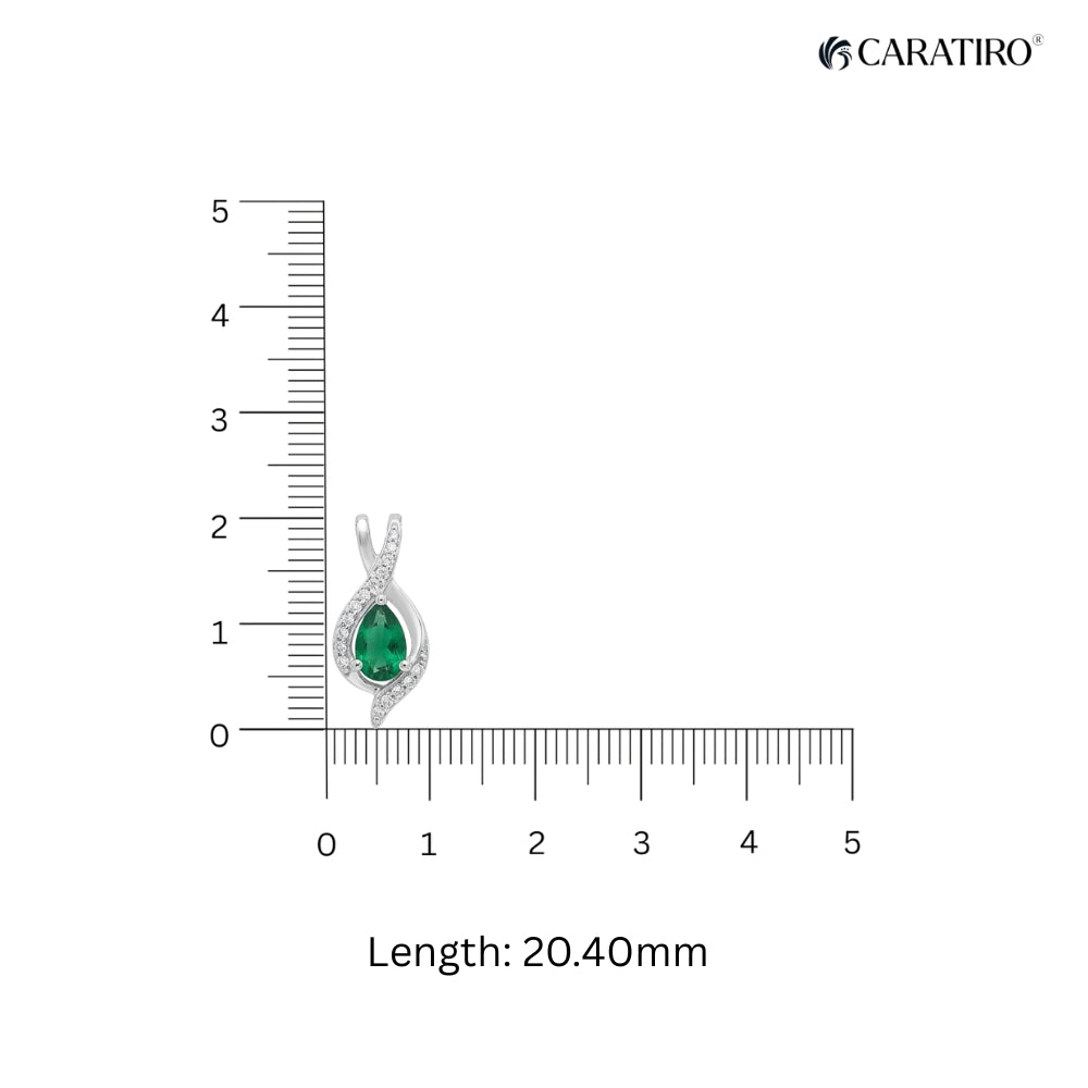 Jewelry pendant with green gemstone and silver frame