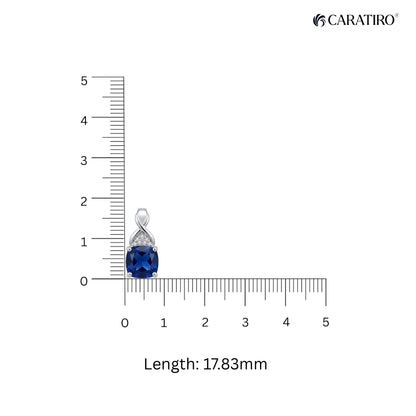 Jewelry pendant with blue gemstone and silver accents