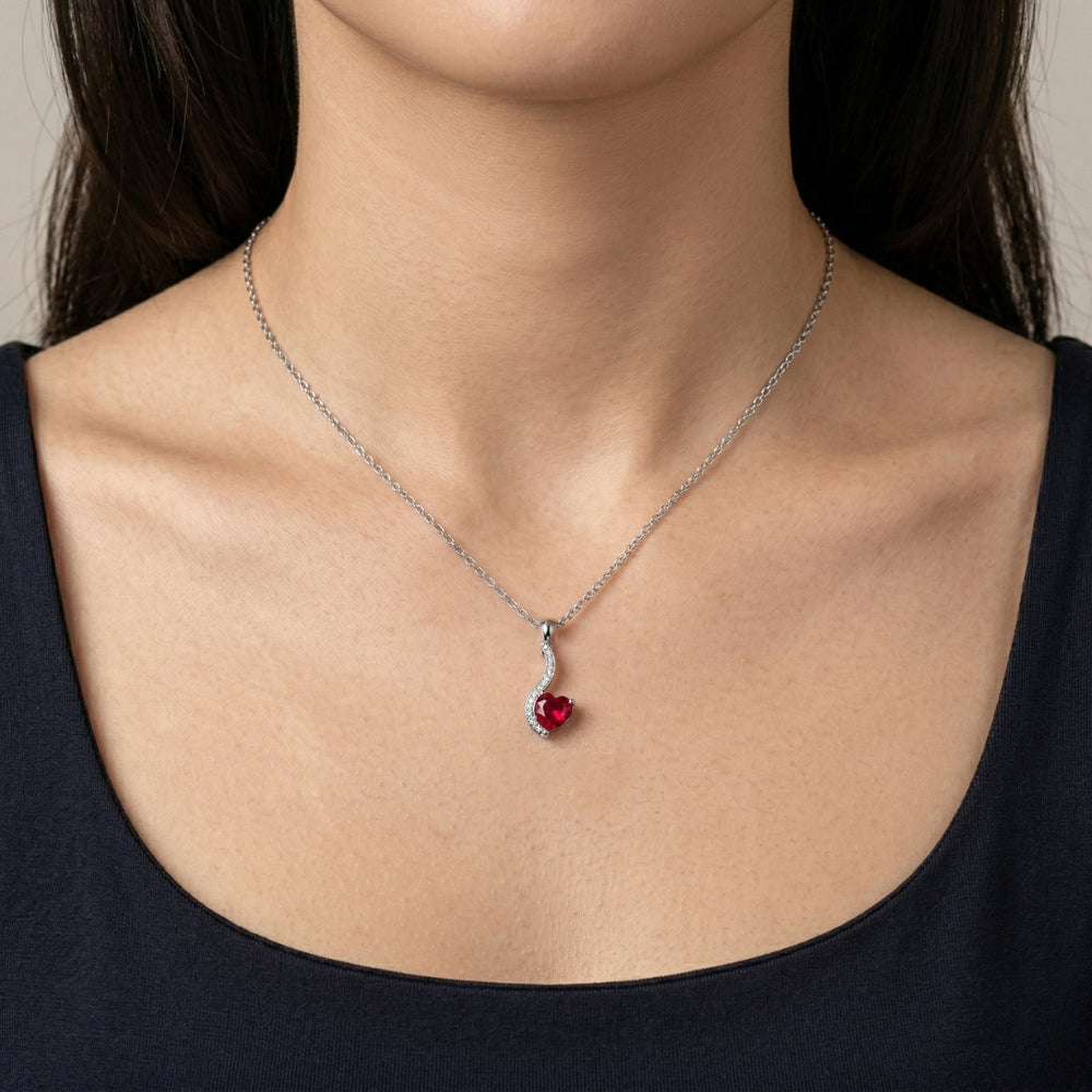 Necklace with a red gemstone pendant 