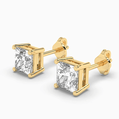 Gold earrings with clear gemstones 