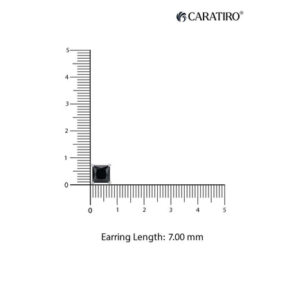 Earring with a ruler showing its length of 7.00 mm earrings