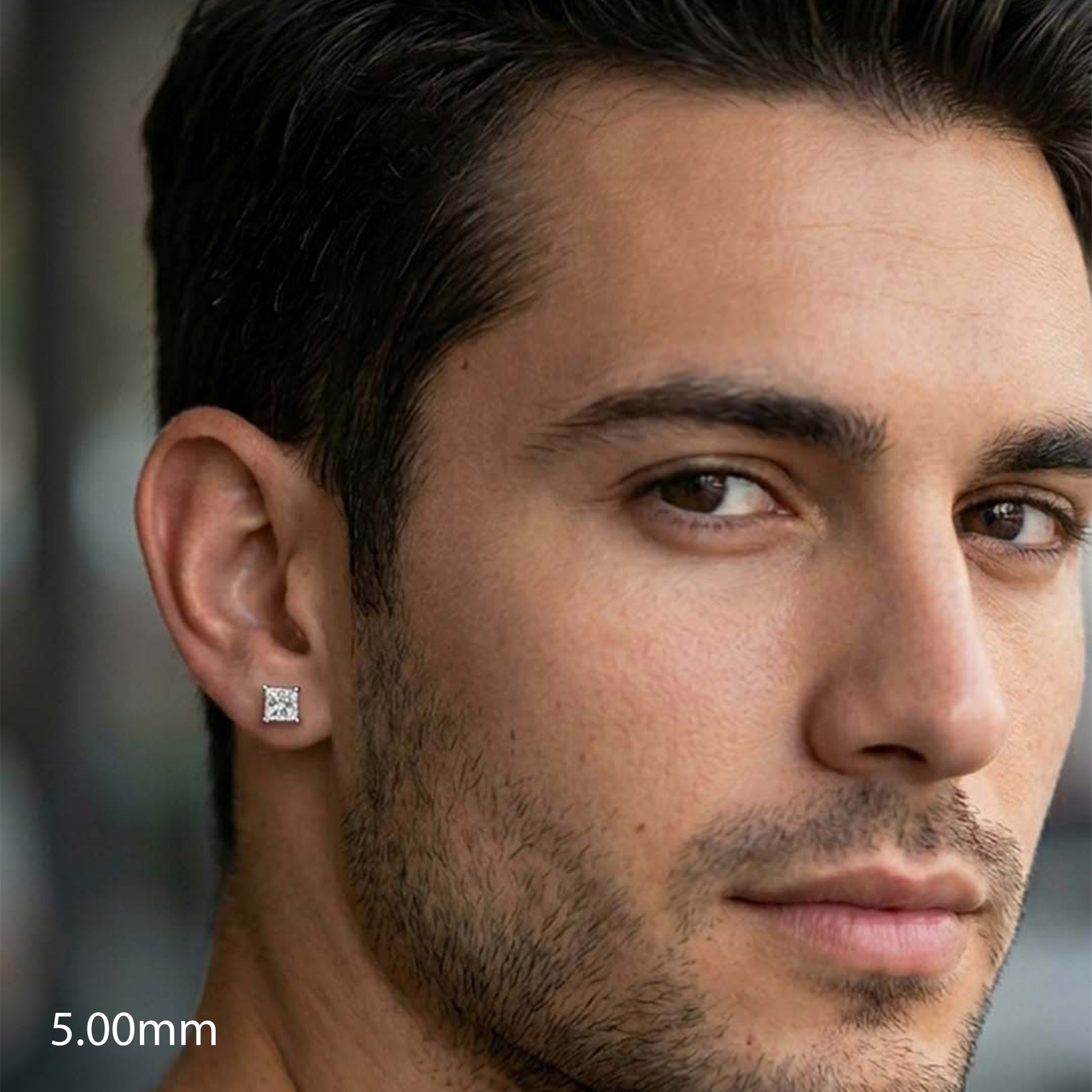 Close-up of a man wearing a diamond earring 