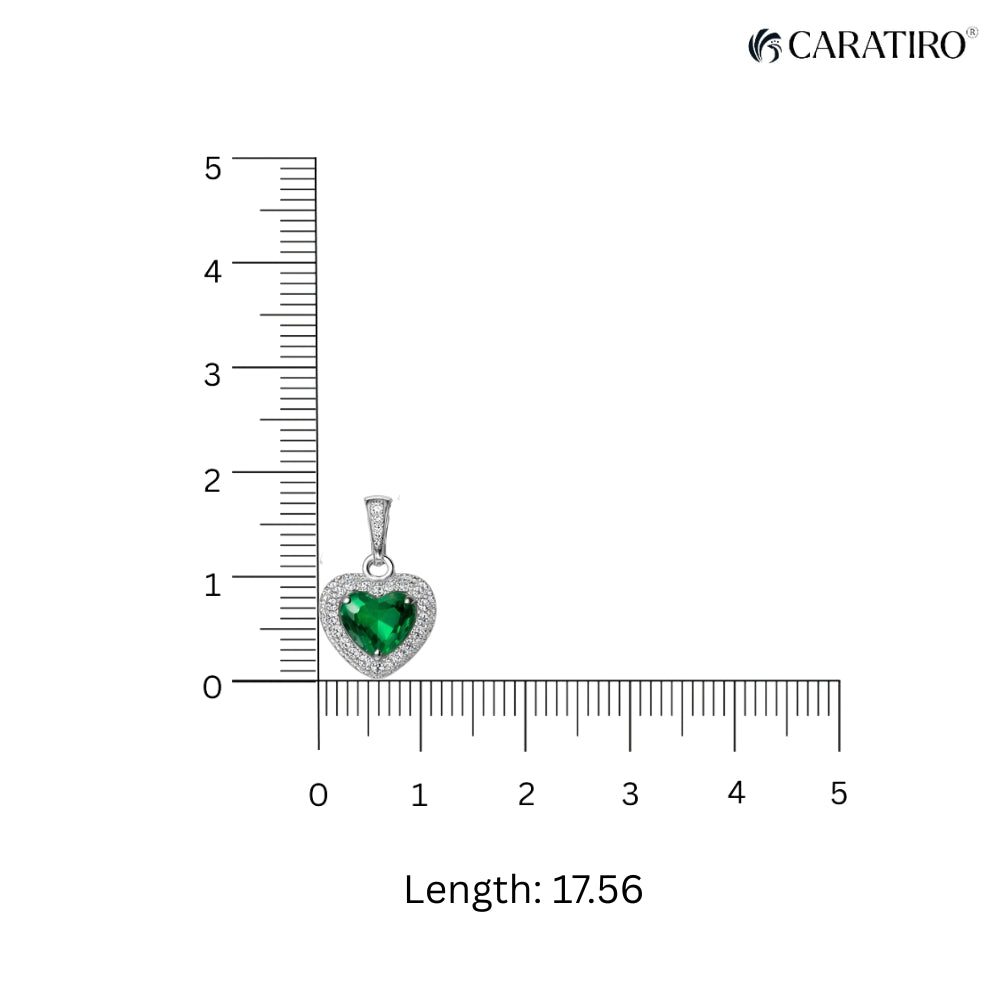 heart-shaped diamond pendant with green emerald