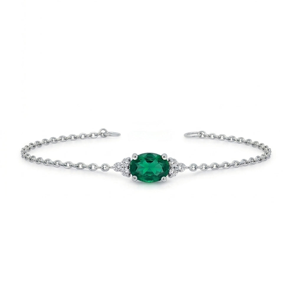 Silver bracelet with a green gemstone 