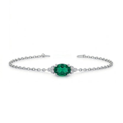 Silver bracelet with a green gemstone 