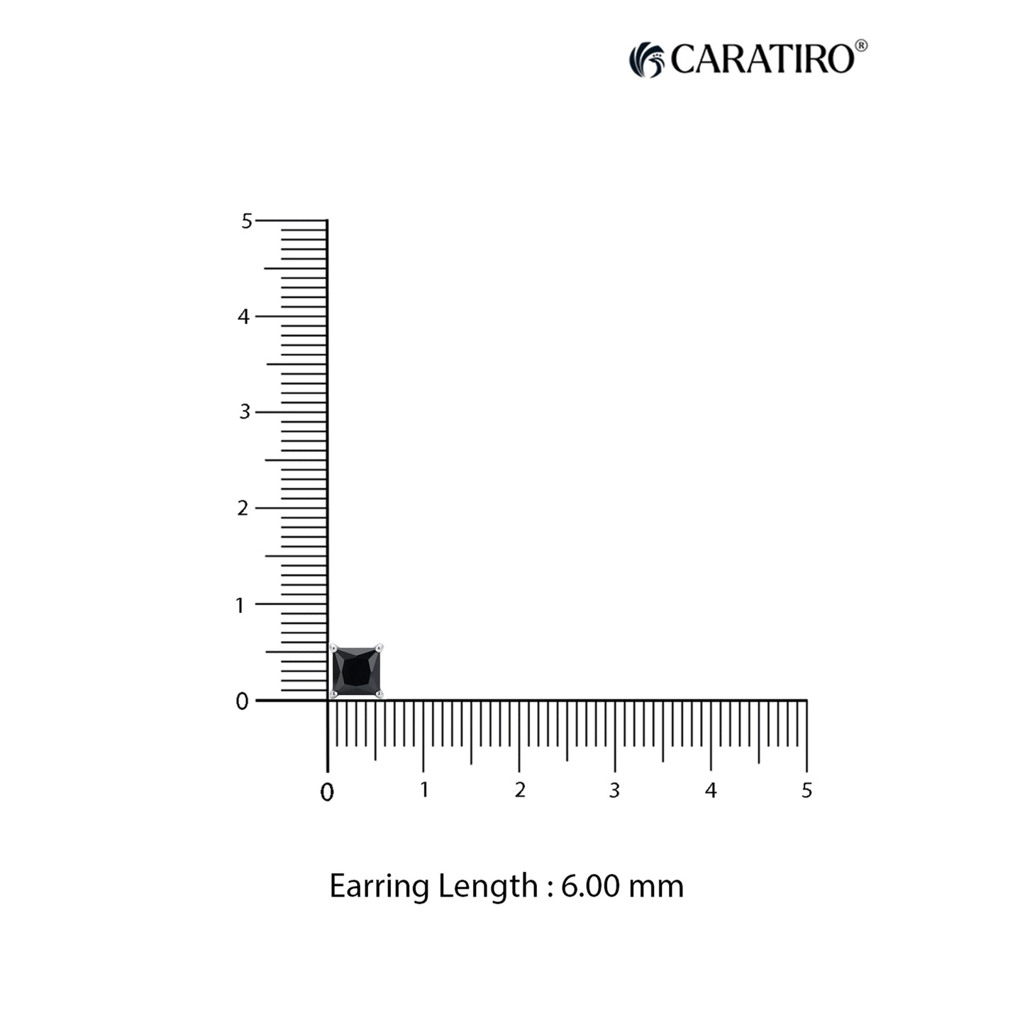 Measurement of an earring length with a ruler on a white background