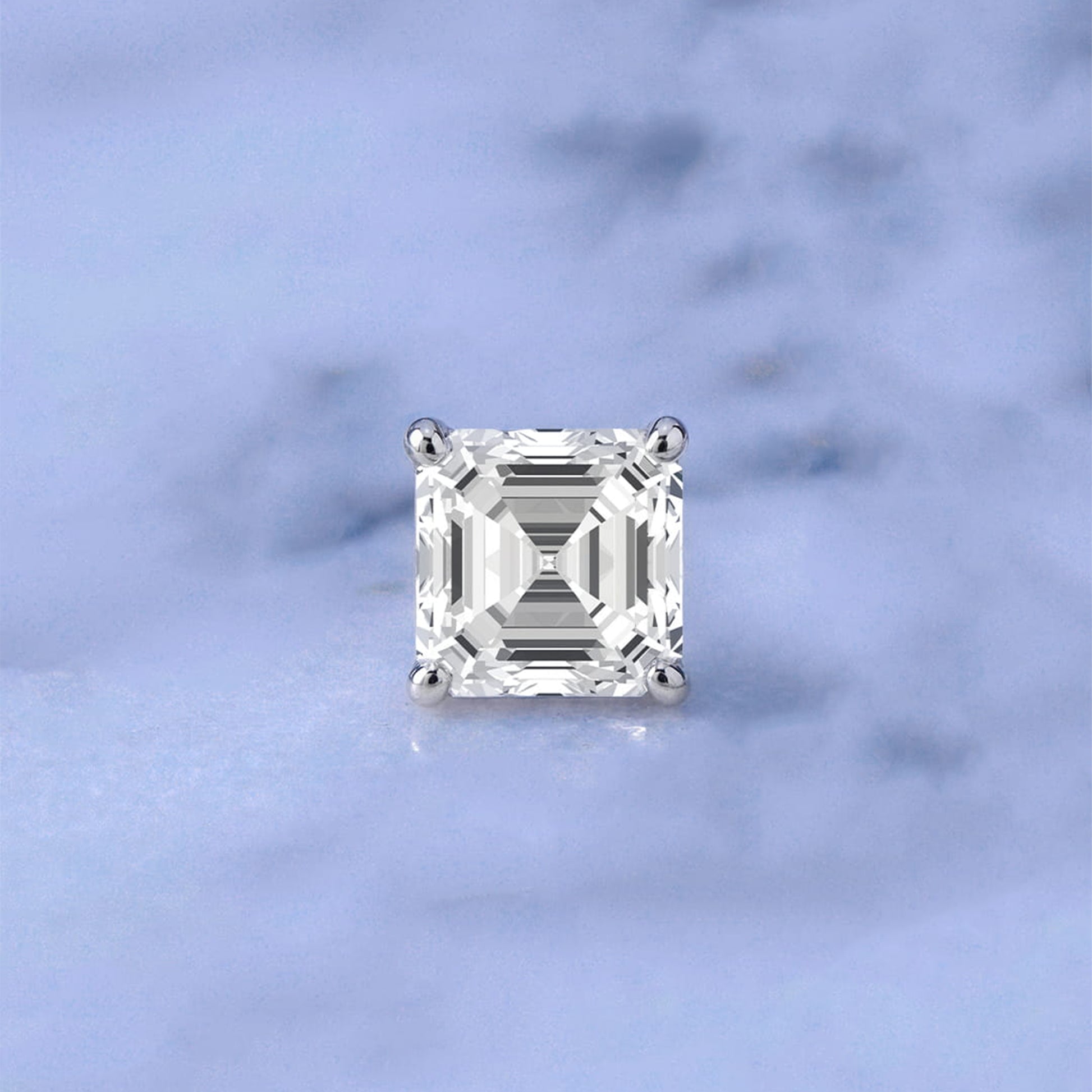 Asscher-cut diamond on a marble background
